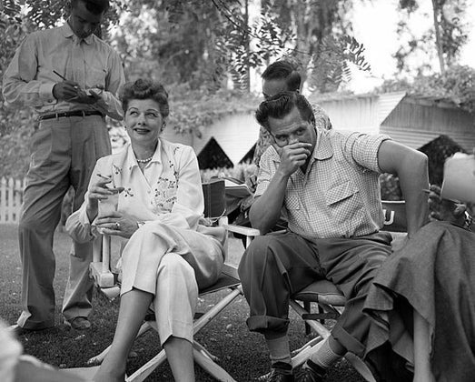 lucille ball and desi arnaz sitting in chairs