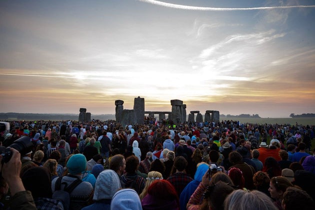 Many people enjoying view of Stonehenge