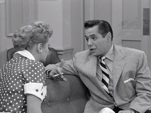 lucille ball and desi arnaz with cigarette